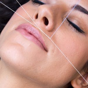 Epilation au fil lèvres